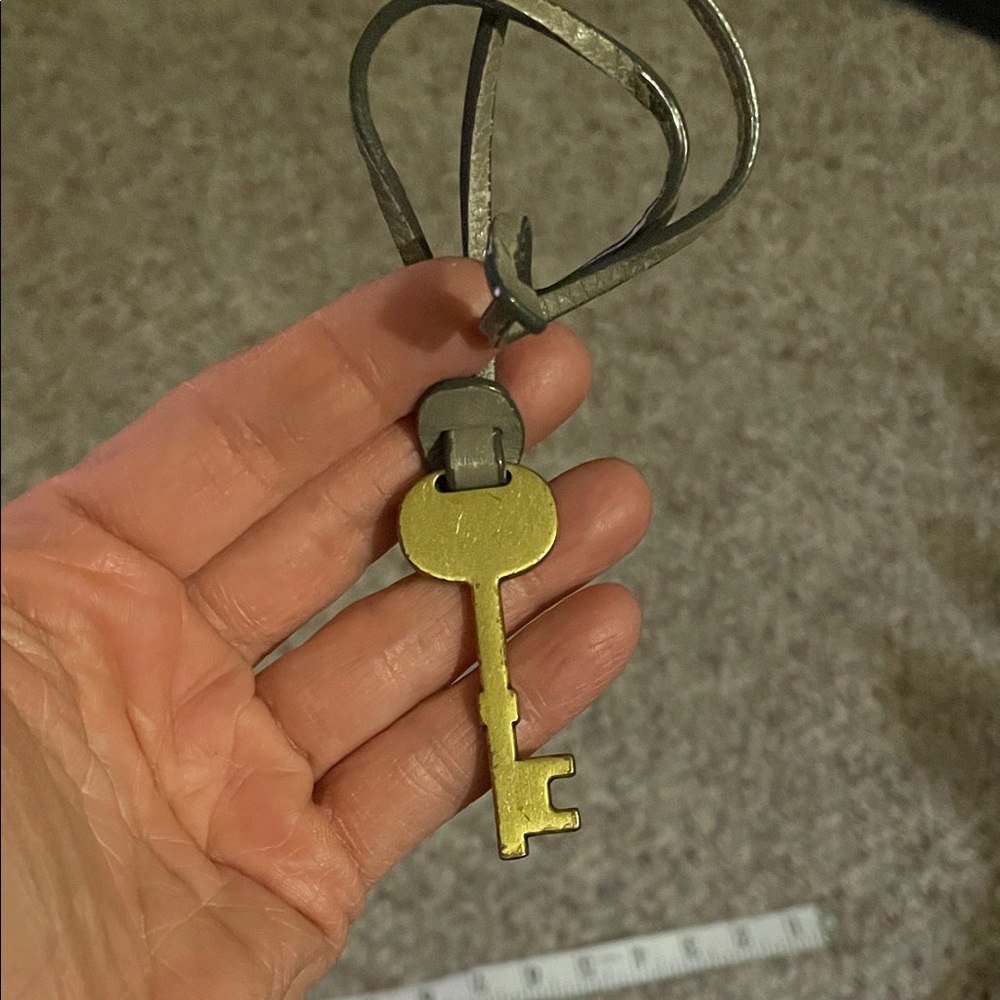 Fossil leather purse charm/key chain with Gold Key - almost new